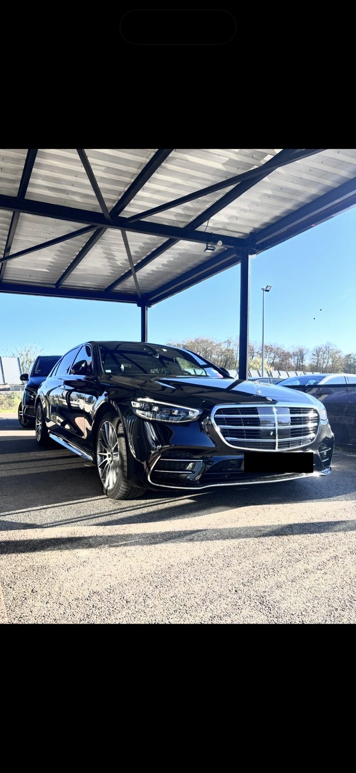 Mercedes Classe S noire sous auvent — véhicule d'exception AMB Élite